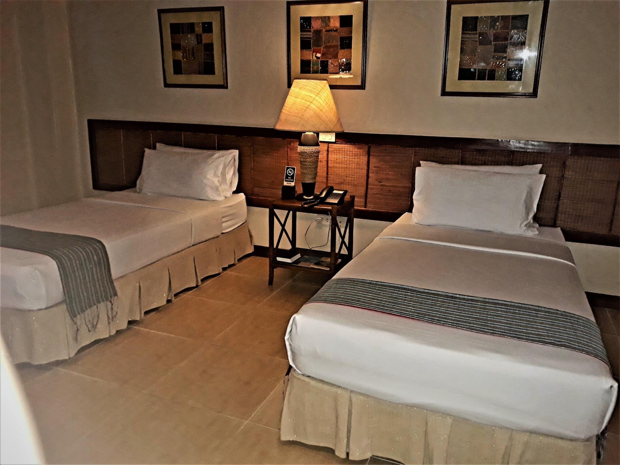Java Hotel Laoag Bagian luar foto