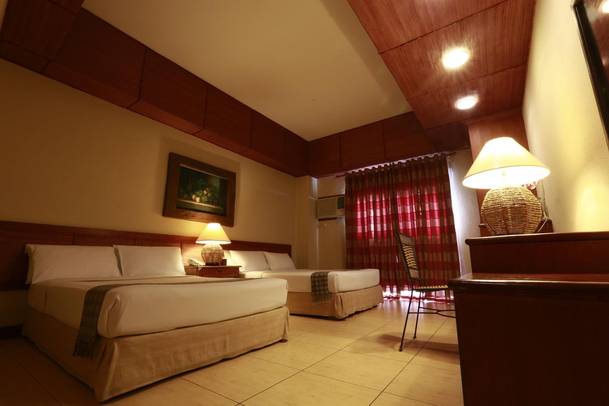 Java Hotel Laoag Bagian luar foto
