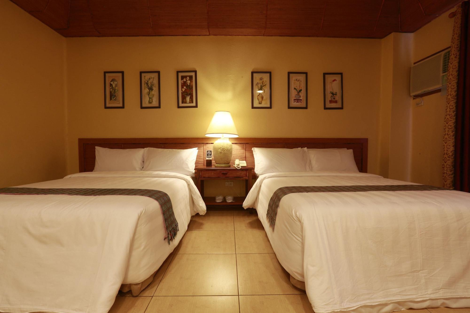Java Hotel Laoag Bagian luar foto