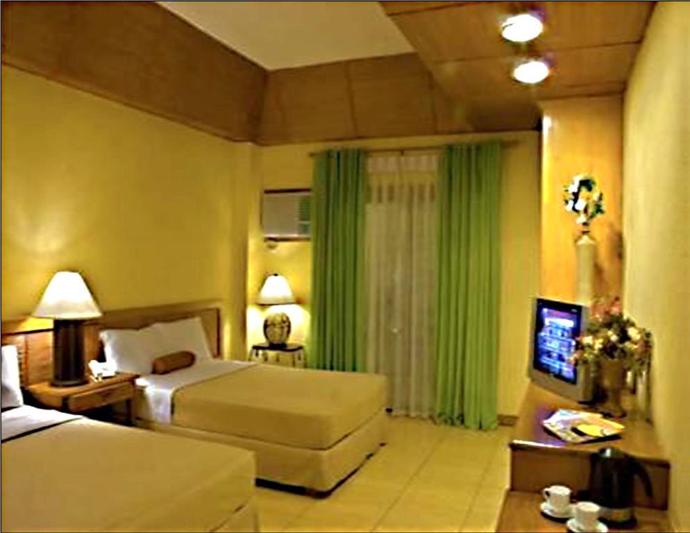 Java Hotel Laoag Bagian luar foto